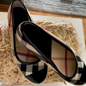 Burberry sneakers size 38. Slightly used. See pics for usage.